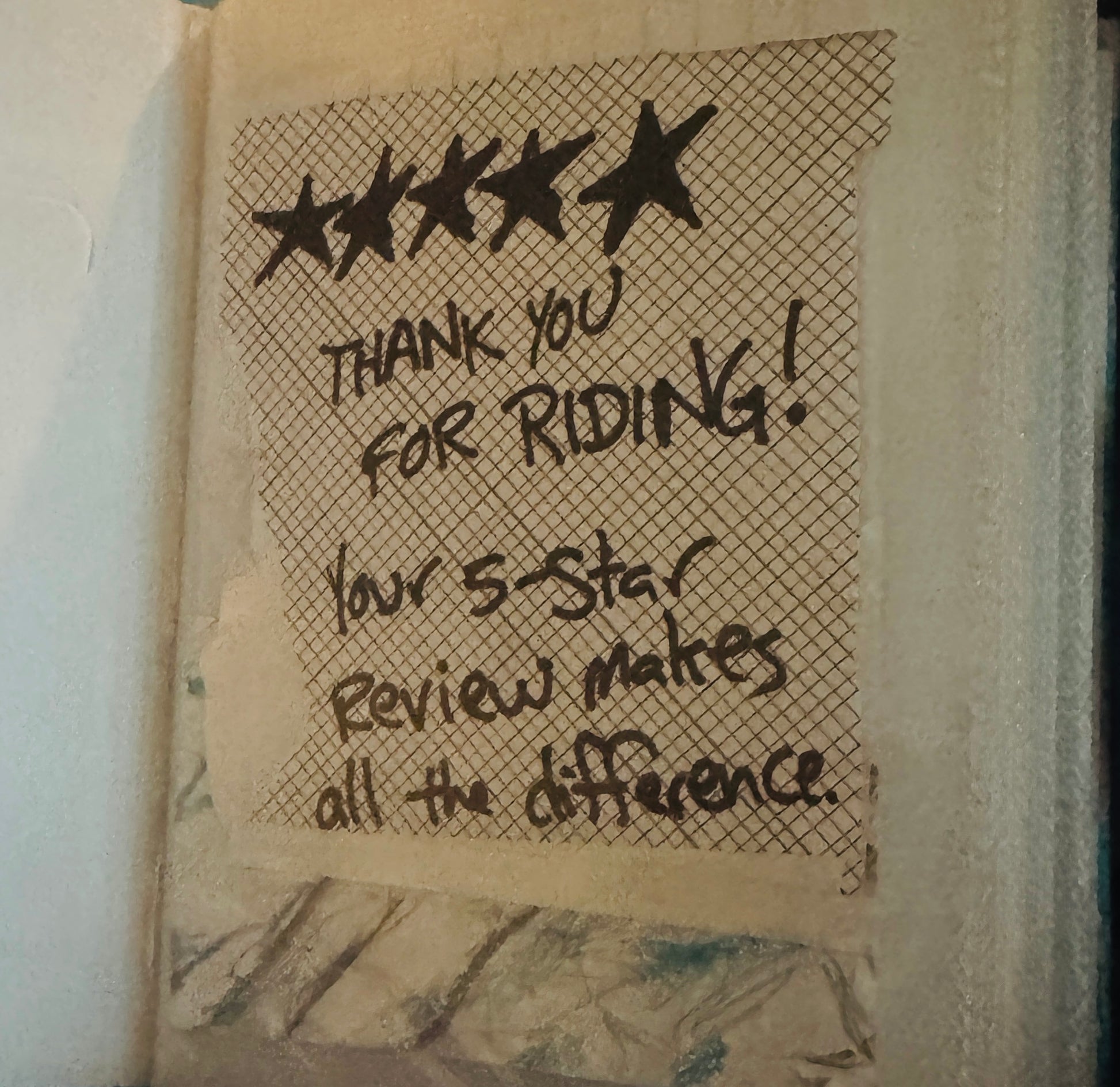 Collage with envelope markings. In sharpie: five start. Thank you for riding! Your 5-star review makes all the difference.