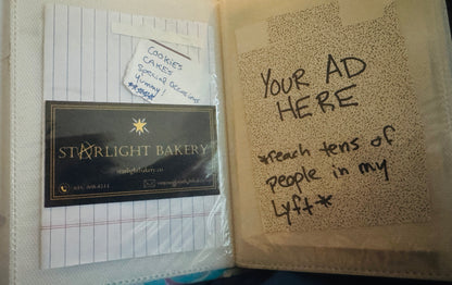 Community Guide Spread announces Starlight Bakery has cookies, cakes, special occassions, yummy! - across from "Your Ad Here. Reach tens of people in my lyft" in sharpie on envelope marks